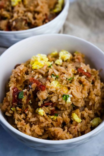 char siu fried rice in a white bowl