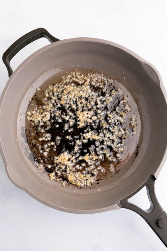 aromatics sauteeing in a pan