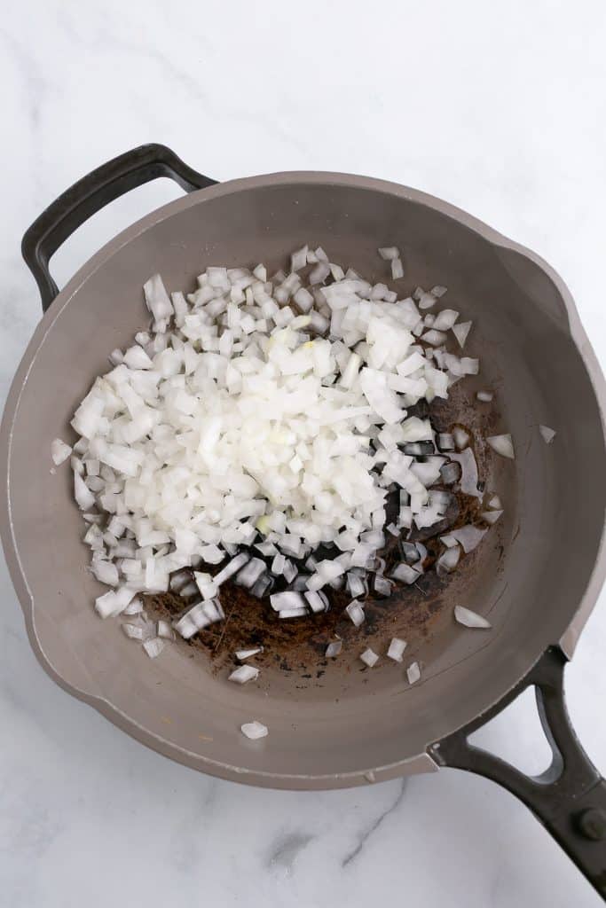 onion sauteeing in a pan