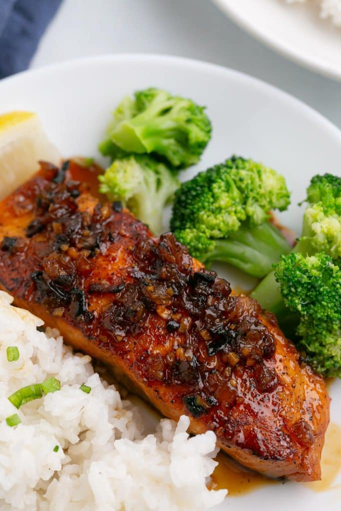honey garlic salmon with white rice and broccoli on a plate