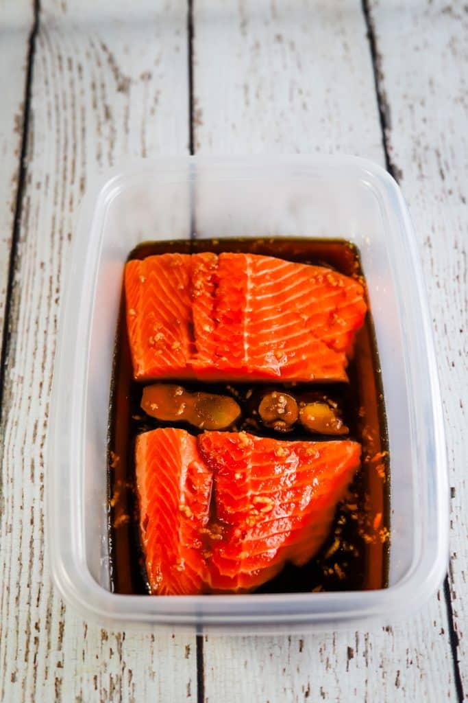 salmon marinating in teriyaki sauce