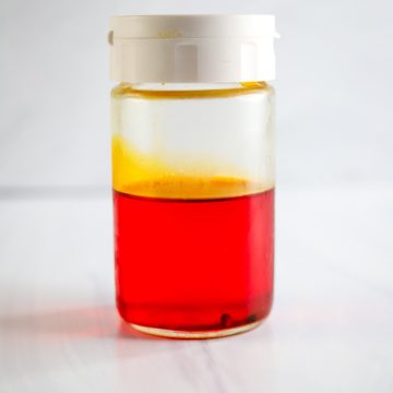 achiote oil in a jar