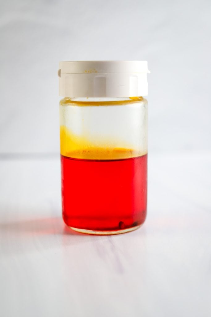 achiote oil in a jar